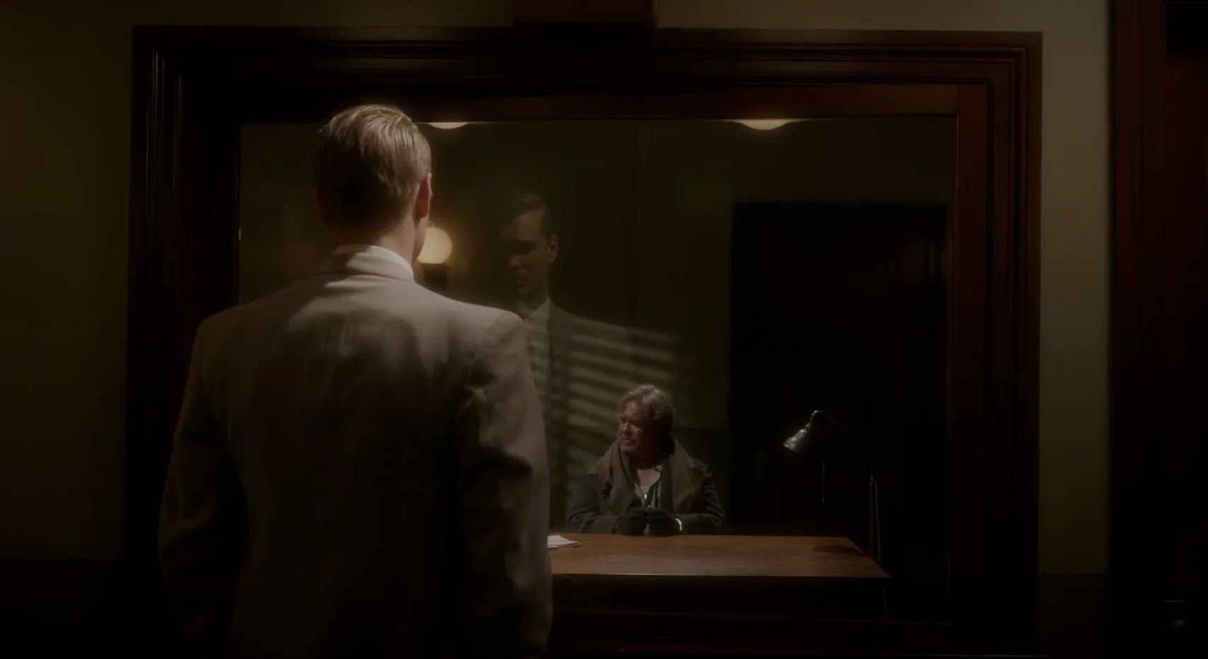 Thompson Observes the Interrogation with Frank