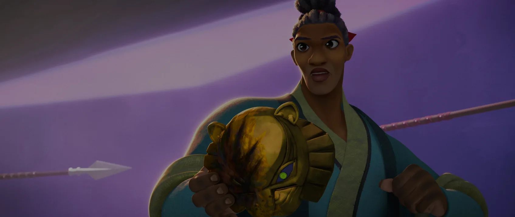 Basha Holds The Lion's Mask