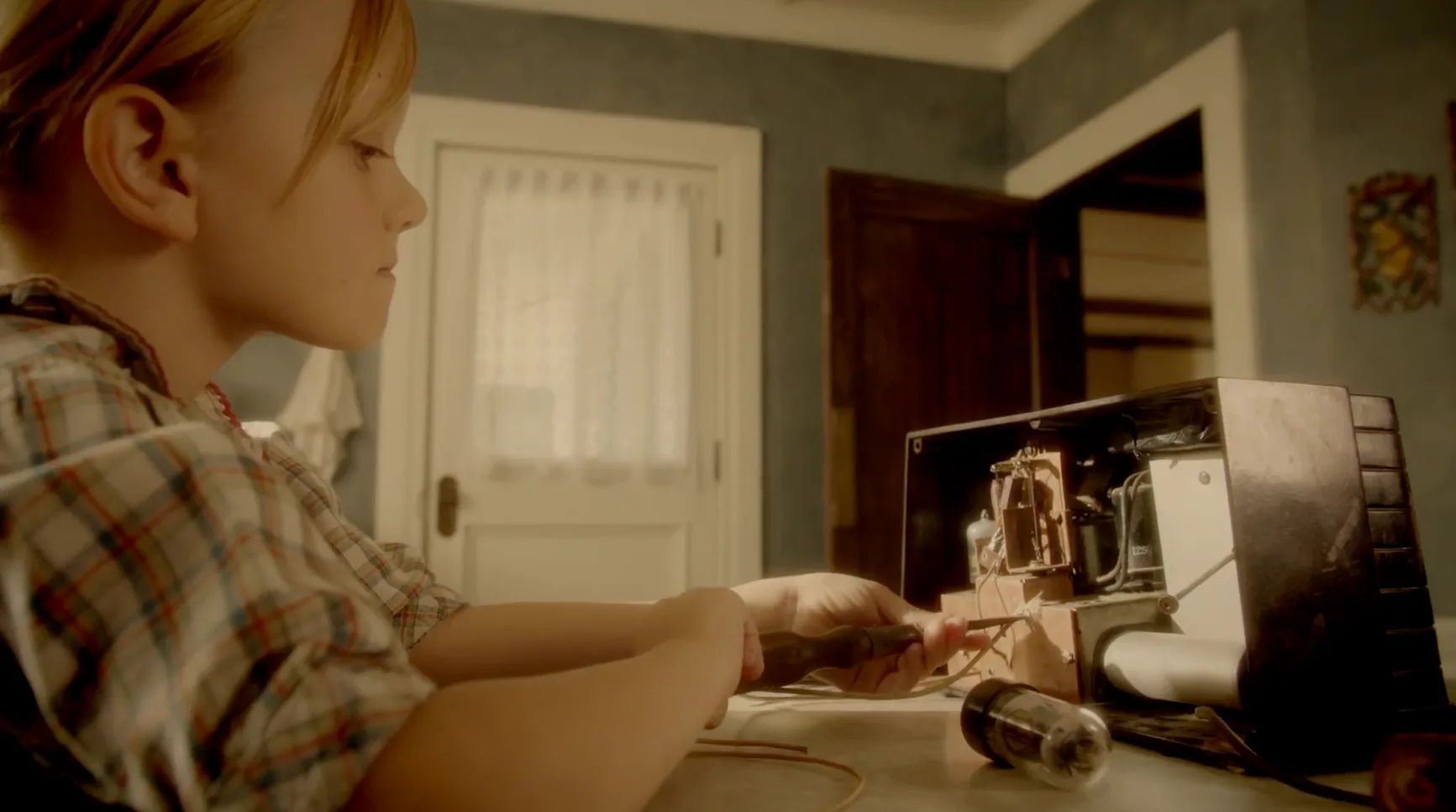 Young Agnes Fixes The Radio